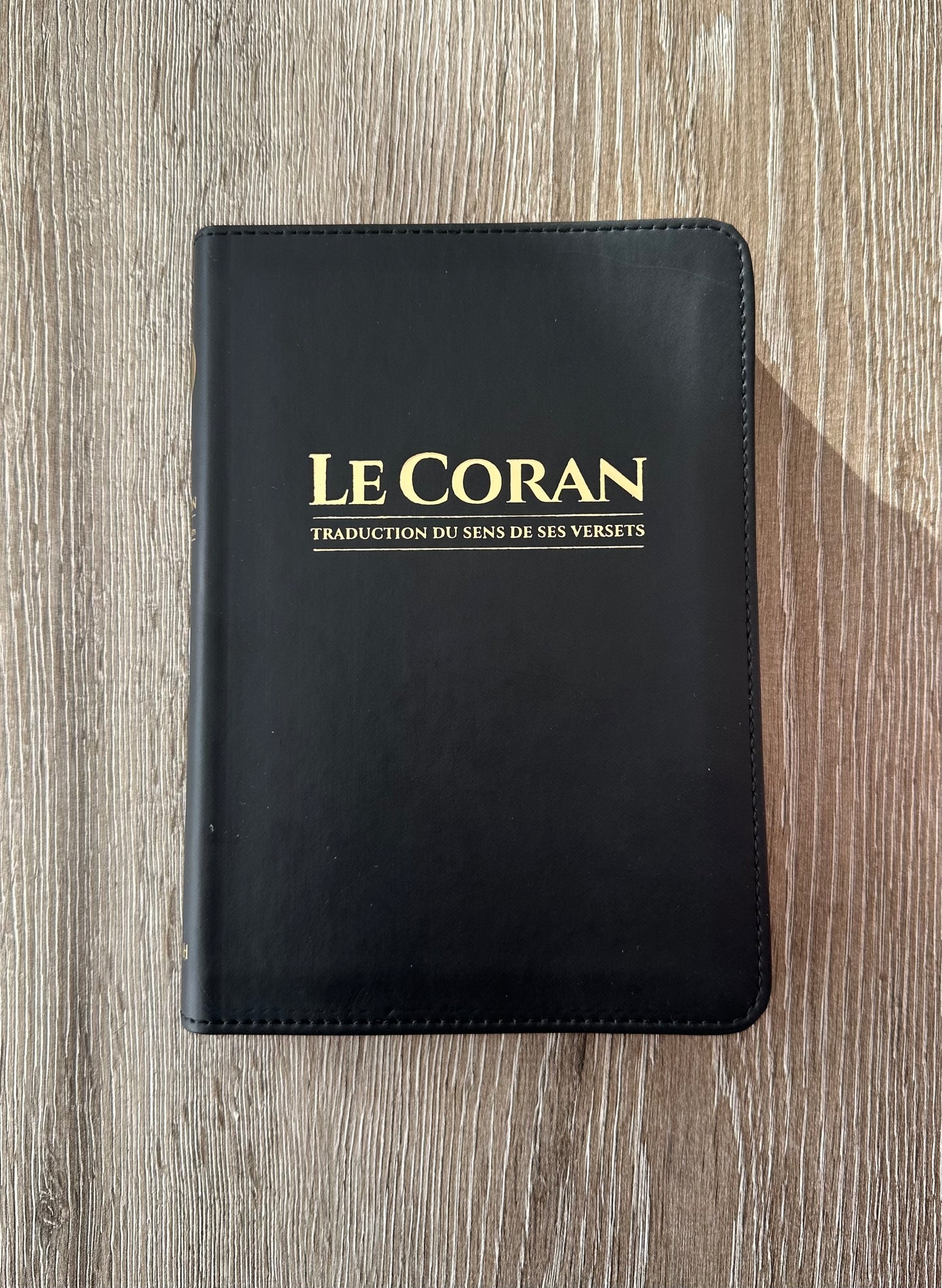 Coran en français